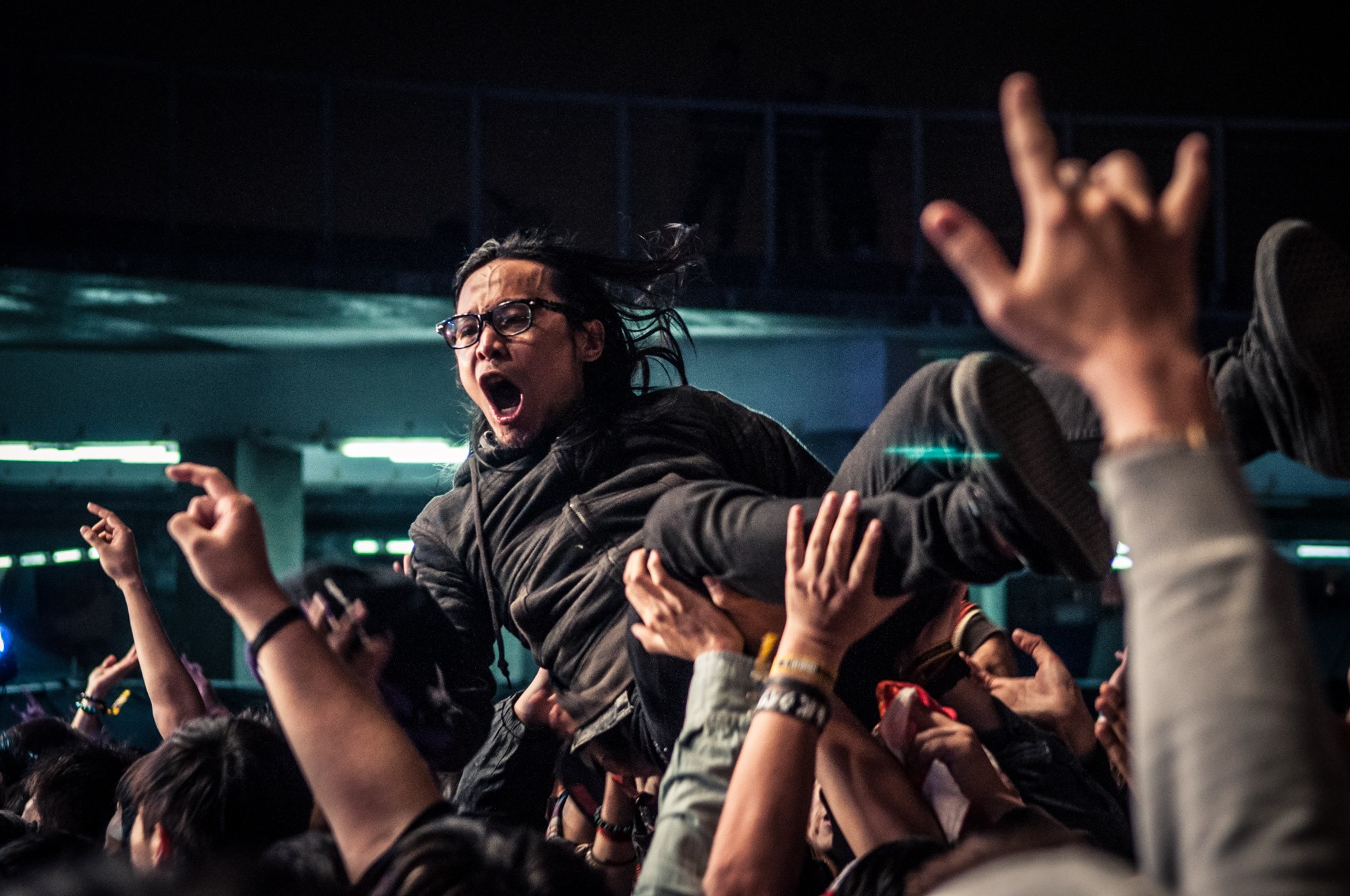 Photo of a Taiwanese music festival attendee crowd-surfing